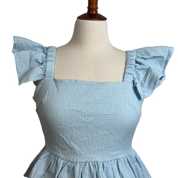 Anisa Peplum Jessie Bow Back Blouse in Light Blue by Francesca’s - Picture 3 of 16